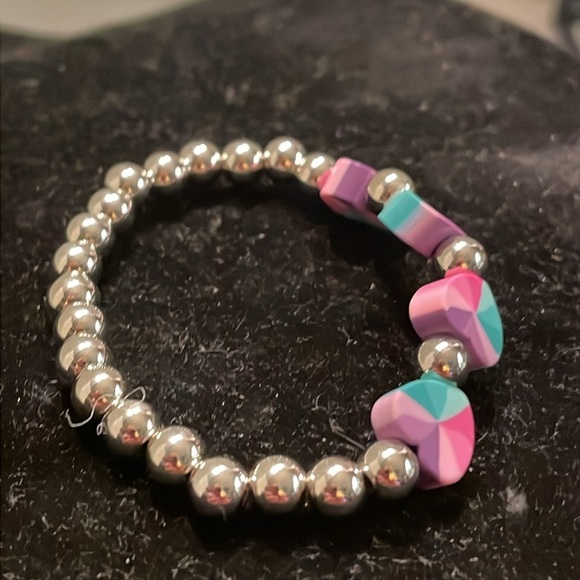 7” beaded stackable stretch bracelet with 23 silver beads & 4 heart shaped beads - Picture 7 of 13